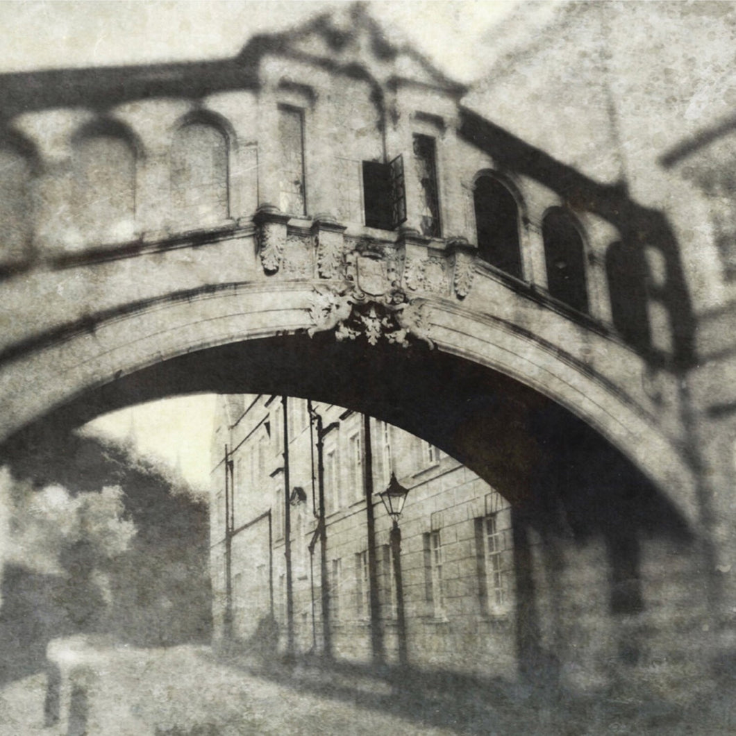 a black and white photo of an old building 