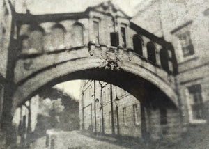 a black and white photo of an old building 